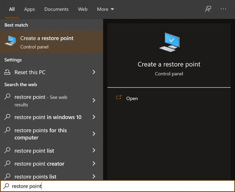 Type restore point in the search bar